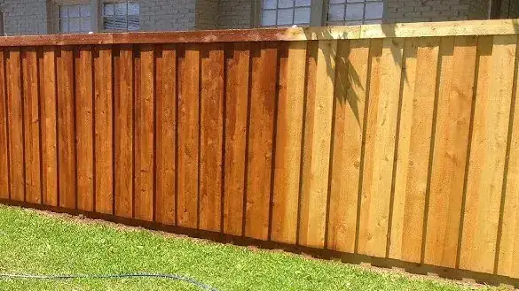 Mid-Stain Timber Fence Transformation